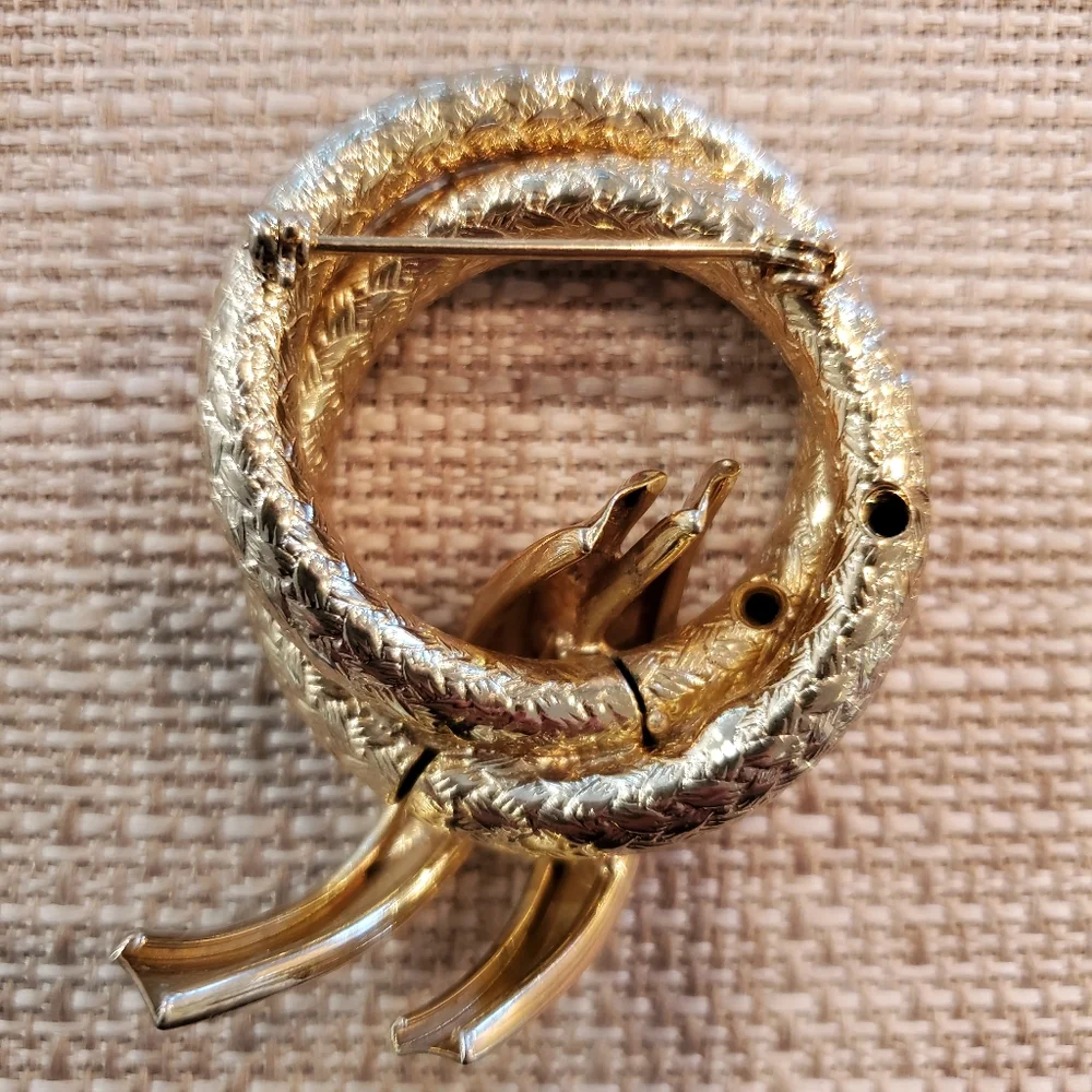 Vintage goldtone swirl brooch